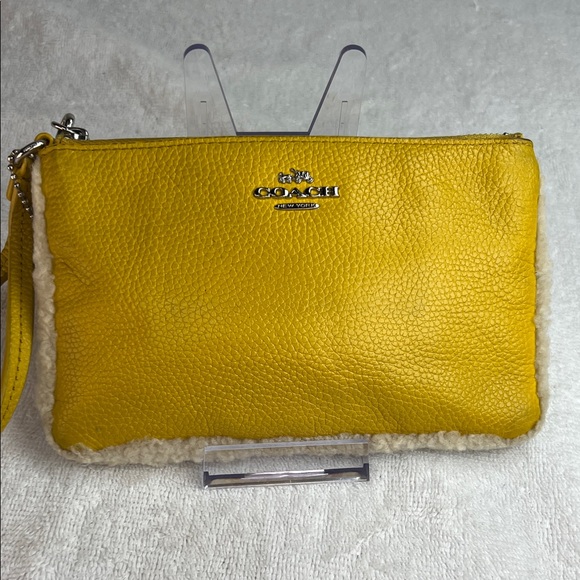 Coach Handbags - Coach 2015 Mustard Yellow Leather Wristlet